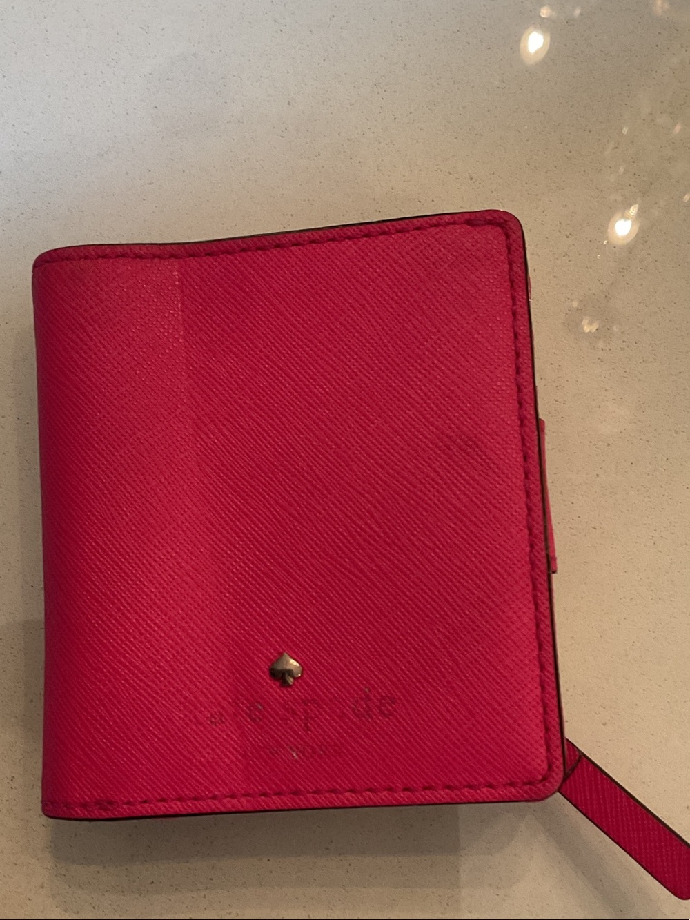 kate spade hot pink bifold wallet with wrist strap